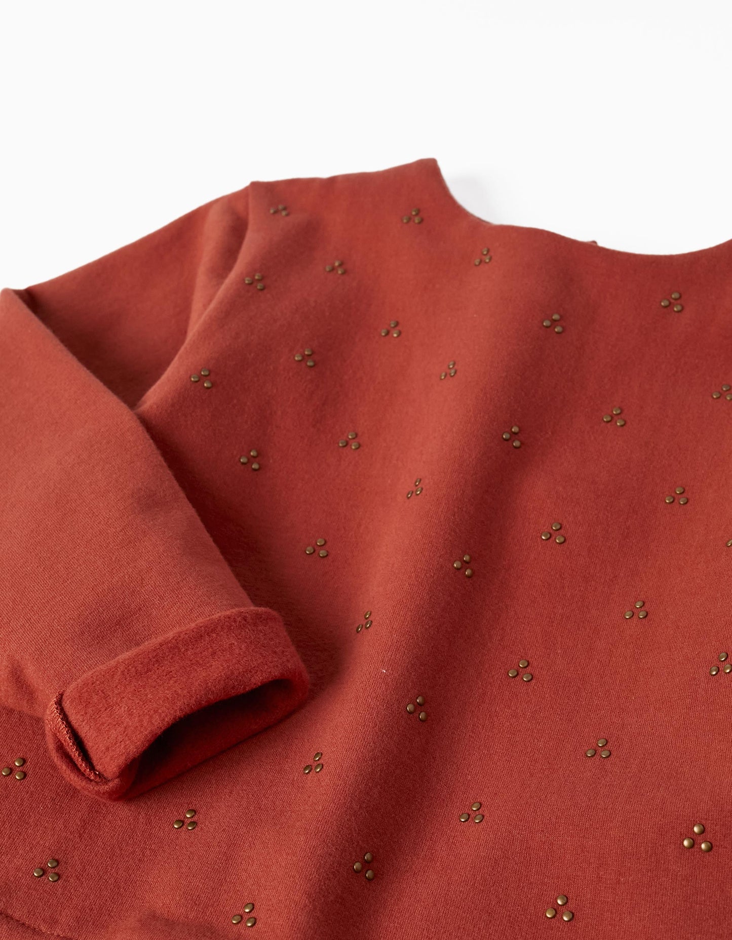 Vestido manga larga con apliques de taches