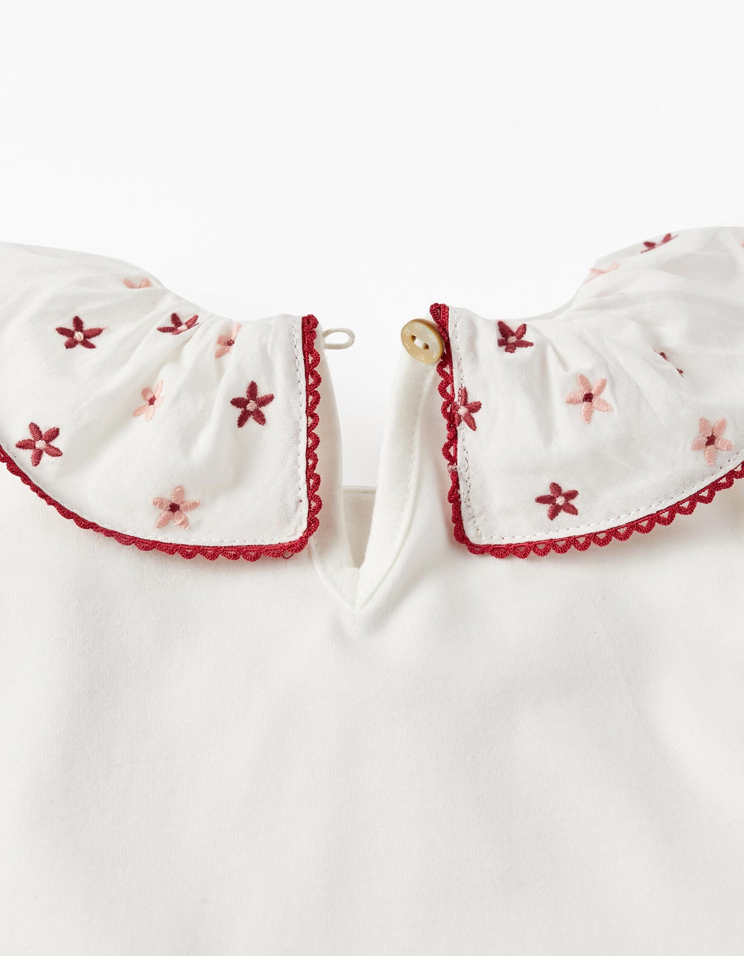 Blusa cuello bolero con flores