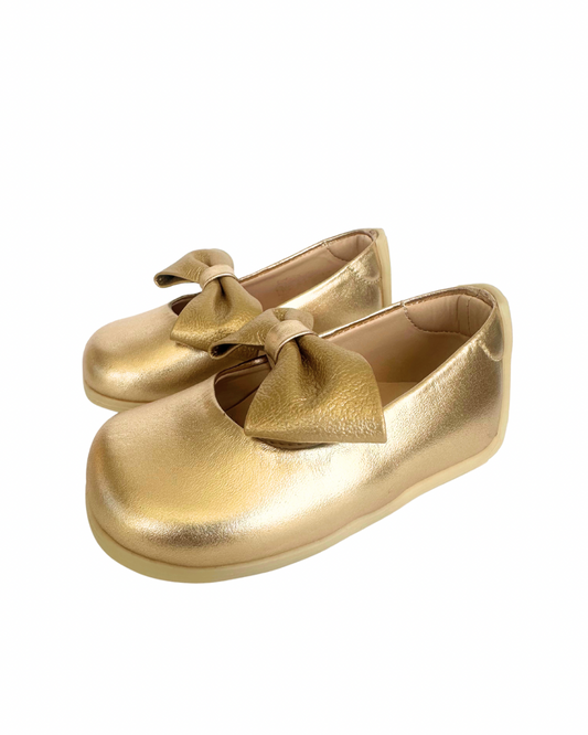 Zapato dorado bebe no tuerce