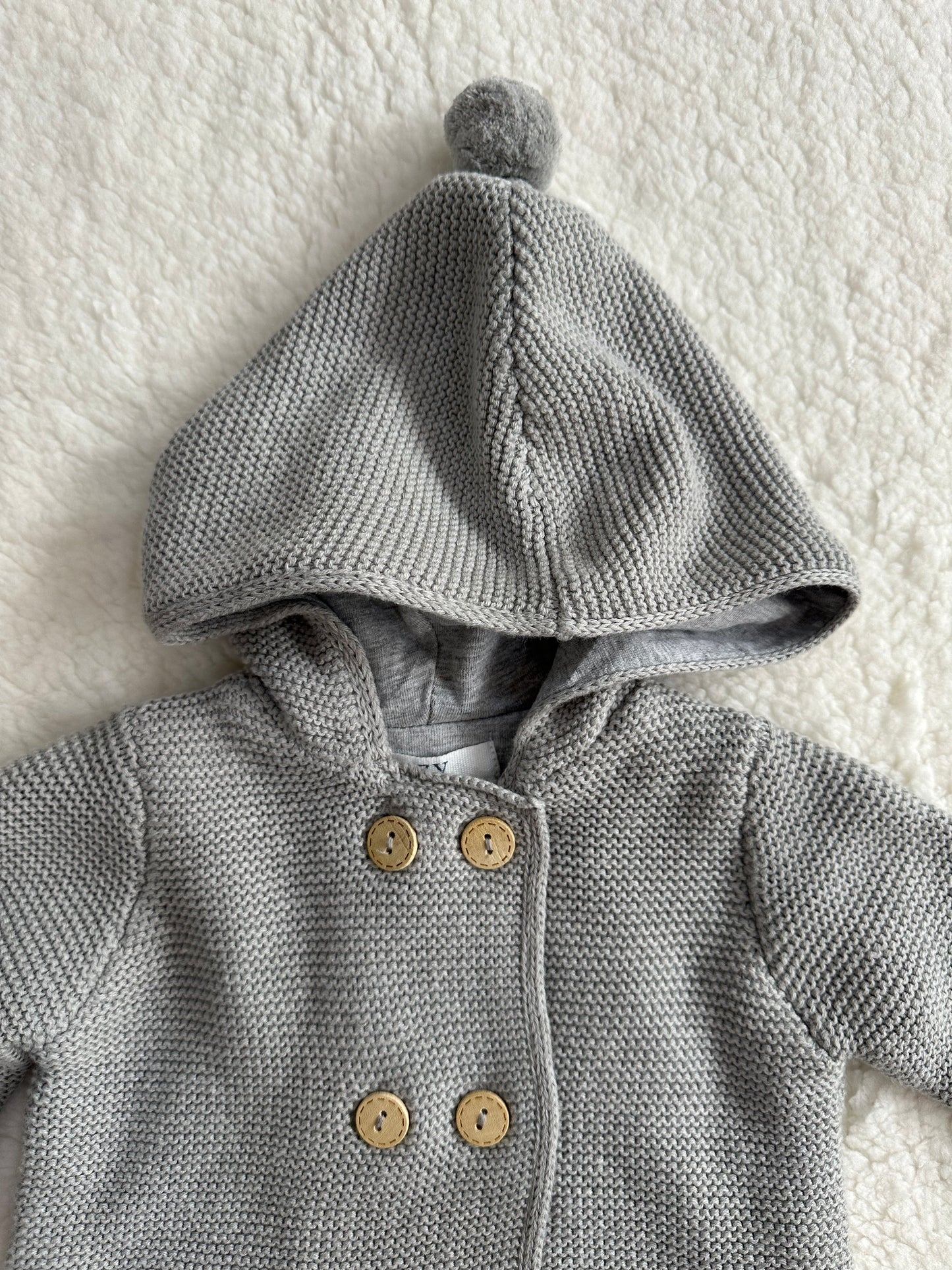 Saco abierto botones y capucha