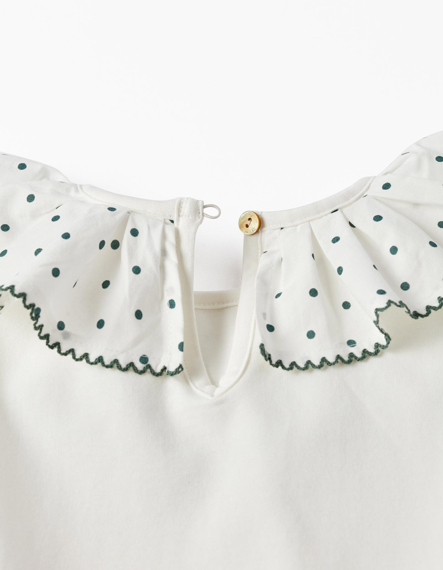 Blusa en algodón cuello pepitas y bordado