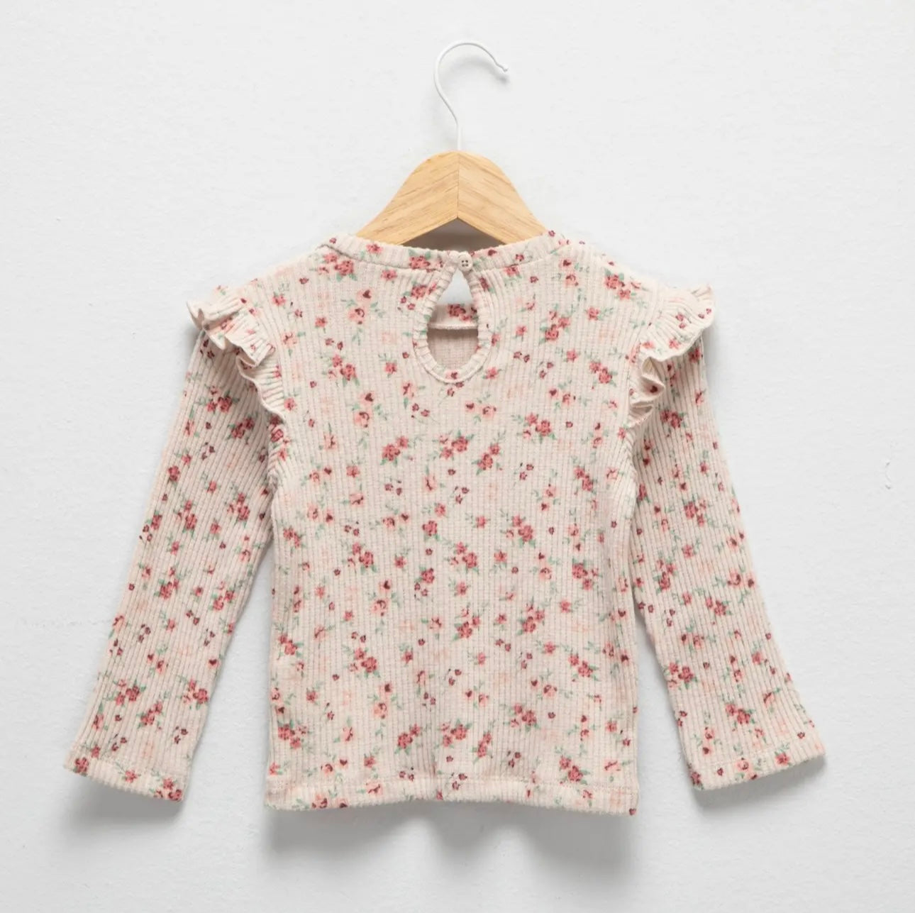 Blusa flores cuello redondo botón atrás